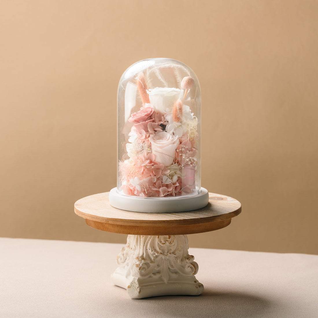 Preserved flowers in a glass dome display, graduation keepsake gift