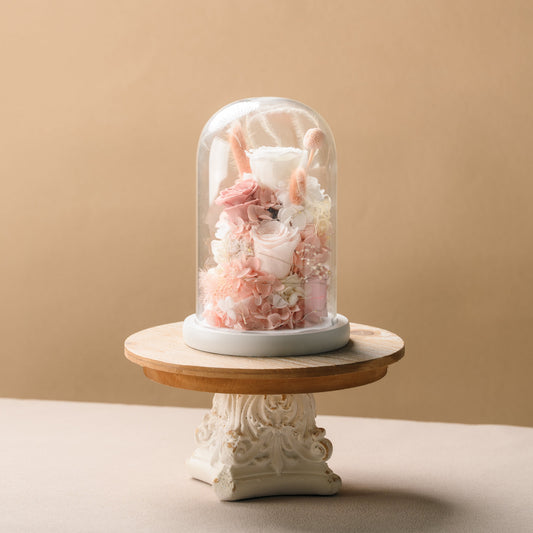 Preserved flowers in a glass dome display, graduation keepsake gift
