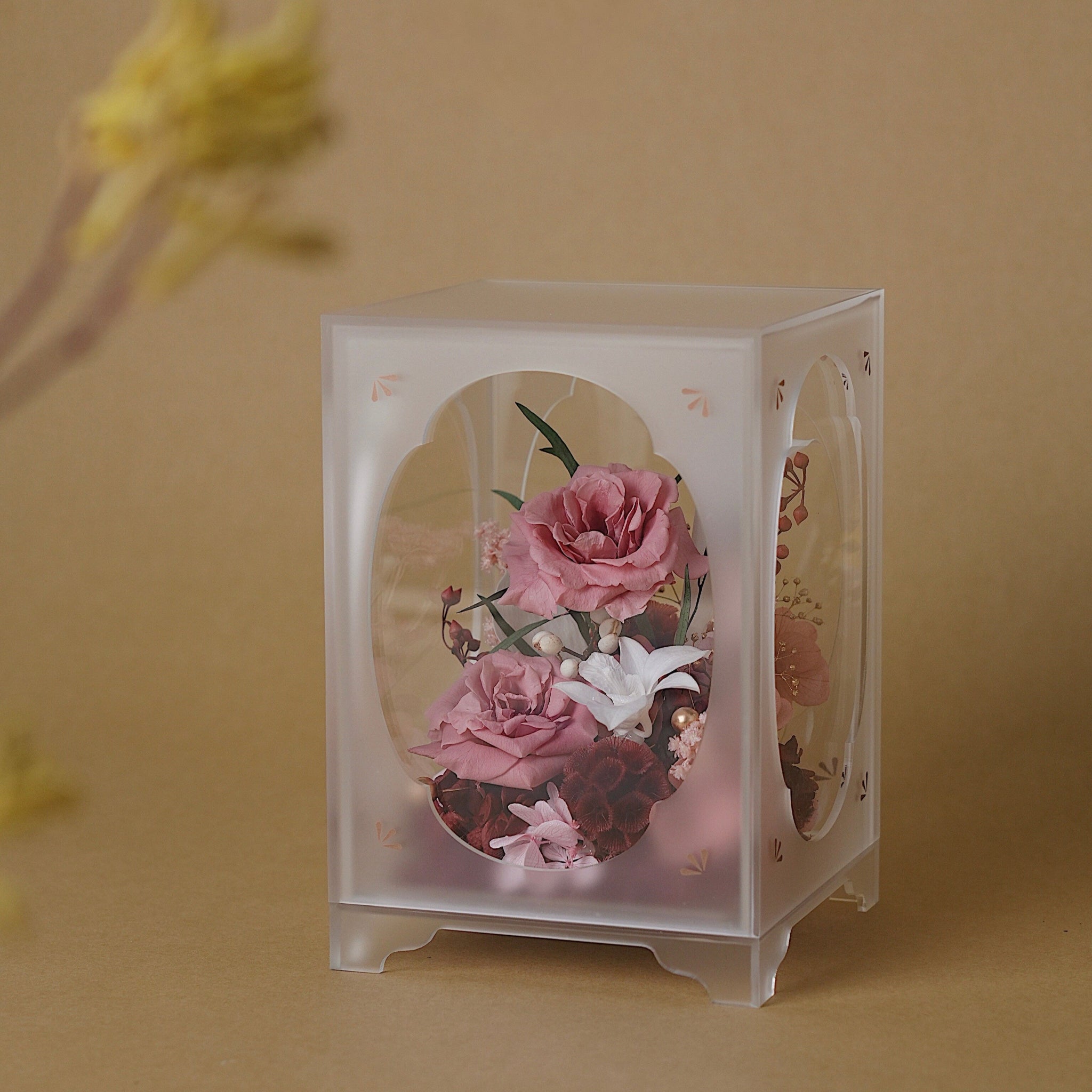 Pink flower arrangment in Acrylic Display box