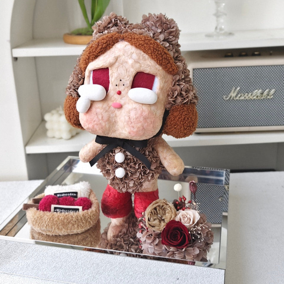 Flower Crybaby-love makes us cry with a decorative stand featuring flowers and a Marshall amplifier in the background.