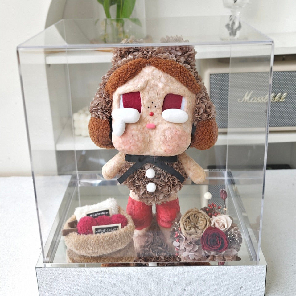 Flower Crybaby-love makes us cry in a clear display case with a white background