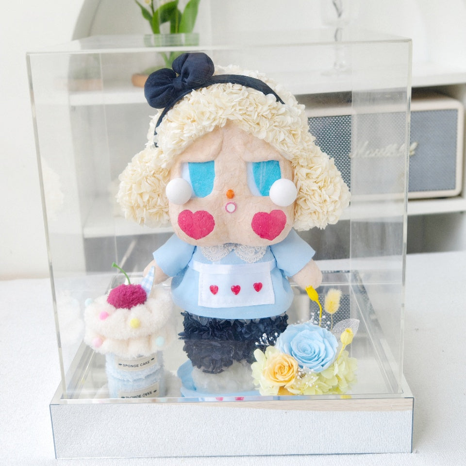 Flower Crybaby-she's alice with a transparent display case on a white surface